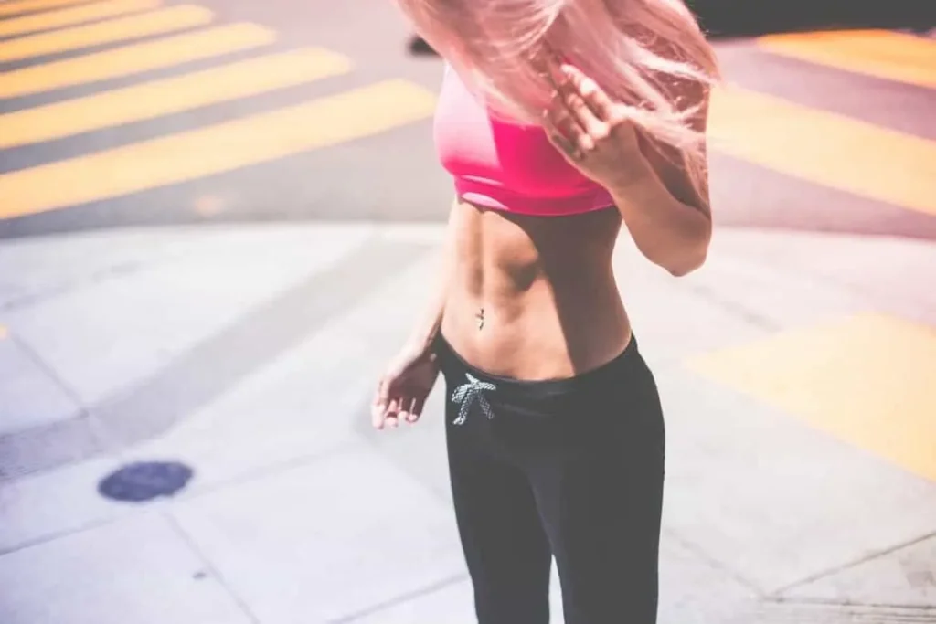 Woman with toned stomach after LA-EMS Body Sculpting Treatment Godmanchester
